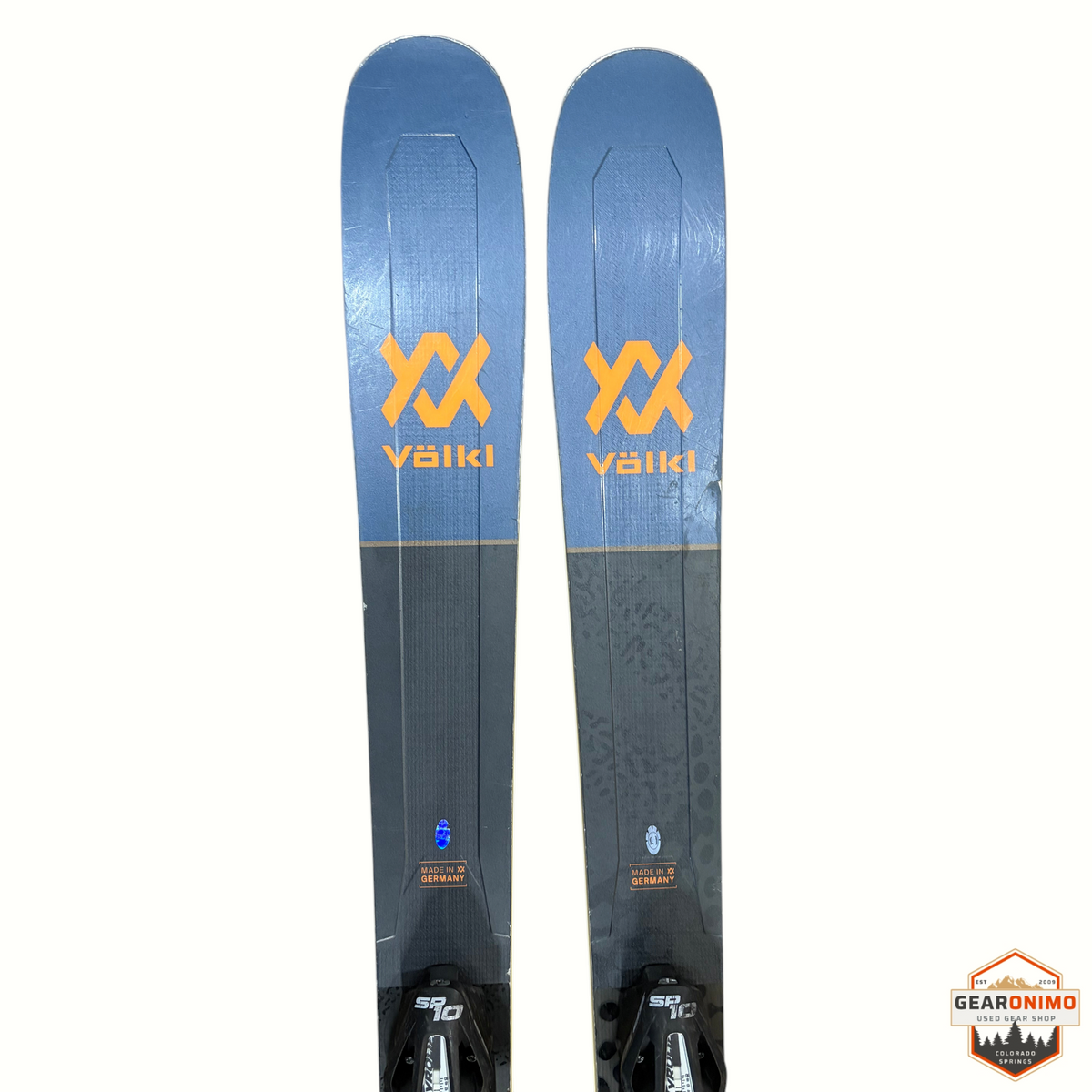 Gearonimo Sports Völkl Secret 92 skis in blue and grey with orange logos and Tyrolia SP 10 bindings, 149cm length.