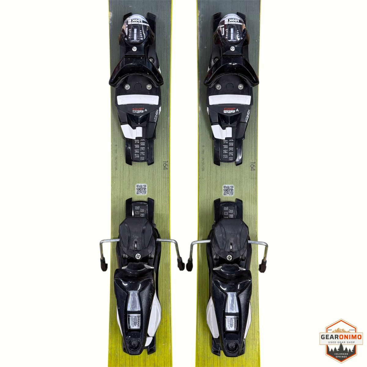 Gearonimo Sports Rossignol Sender Soul 102 skis in olive green with pre-mounted black Look Nx 12 bindings