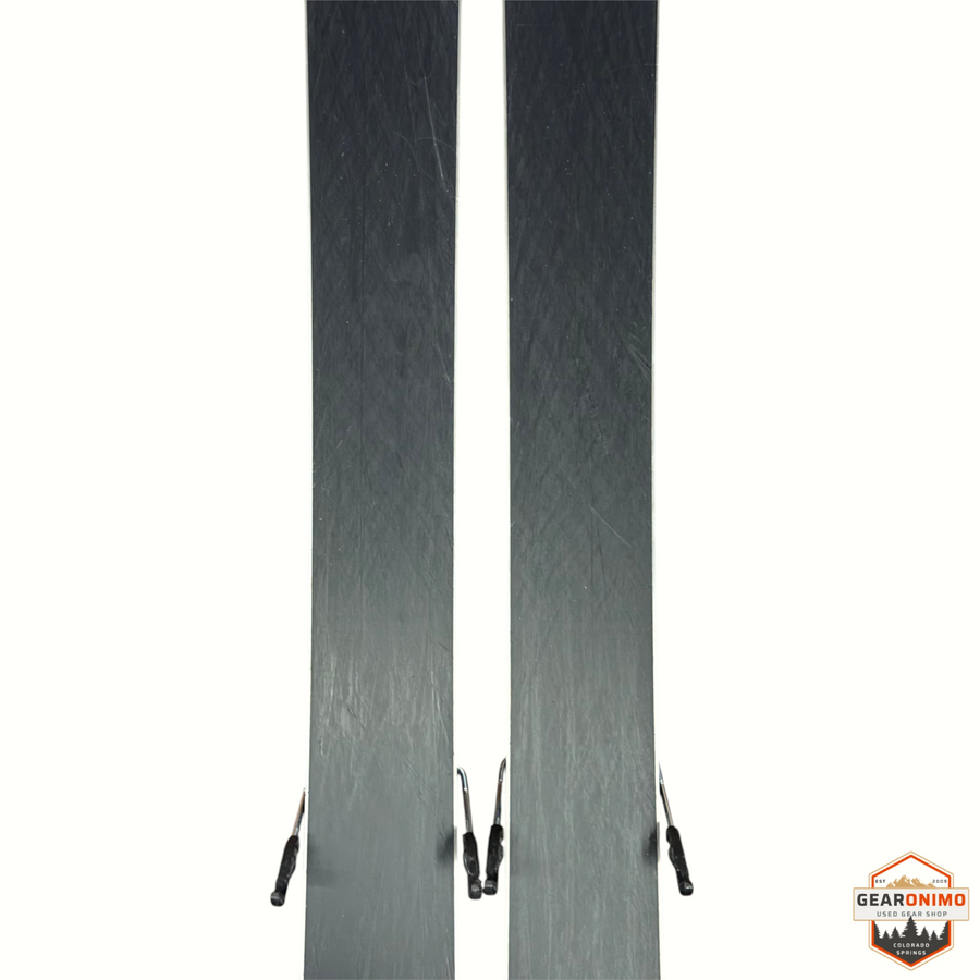 Gearonimo Sports Atomic Bent Chetler 100 skis with Strive 11 bindings, featuring black bases in 186cm length.