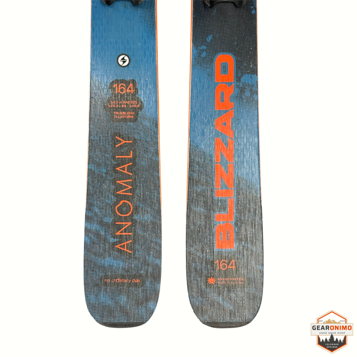Gearonimo Sports Blizzard Anomaly 88 skis in blue and grey with orange branding, size 164cm, top view.