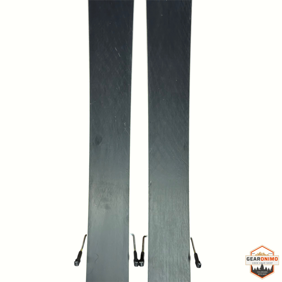 Gearonimo Sports Rossignol Sender Soul 102 skis with Look Nx 12 bindings, showing the black bases of the 180cm skis.