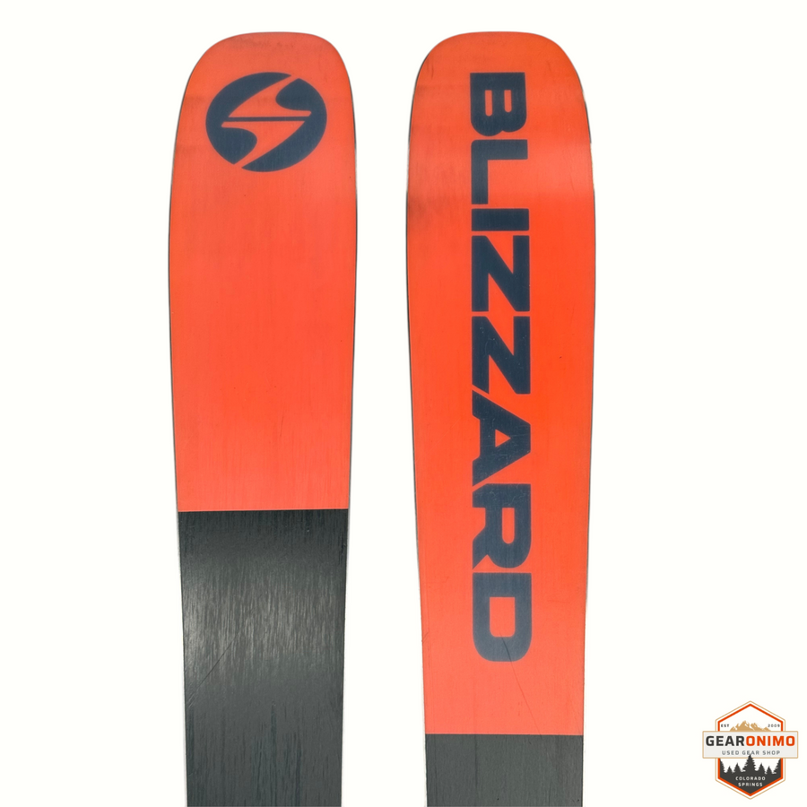 Gearonimo Sports Blizzard Sheeva 9 skis in bright orange and black with bold branding, 150cm length.