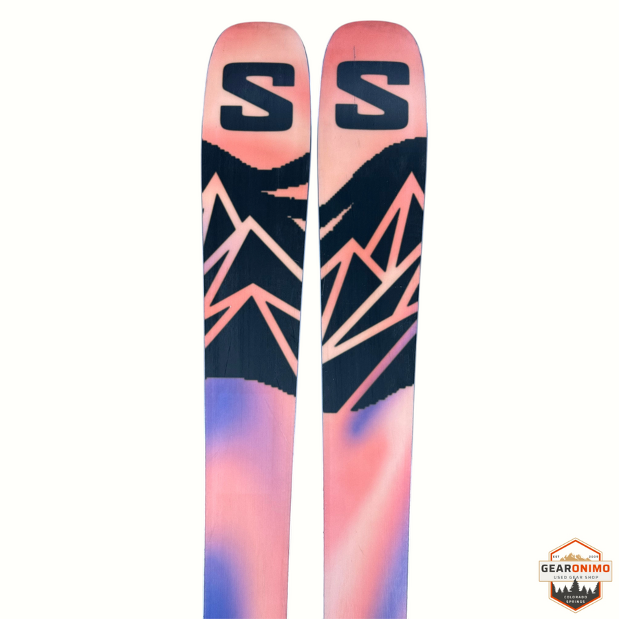 Gearonimo Sports Salomon Qst 94 skis with mountain graphic design in pink, black, and purple, 172cm length.