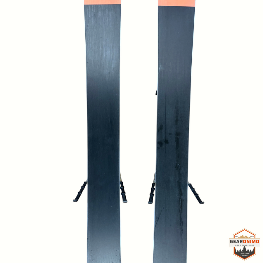 Gearonimo Sports Völkl Secret 92 skis with black bases and orange tips, 149cm length with Tyrolia Sp 10 bindings
