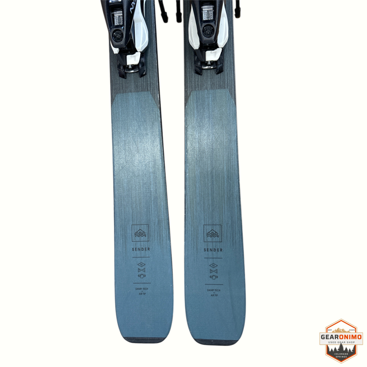 Gearonimo Sports Rossignol Sender 94ti skis with Look Nx12 bindings in grey, featuring Damp Tech and Air Tip technology.