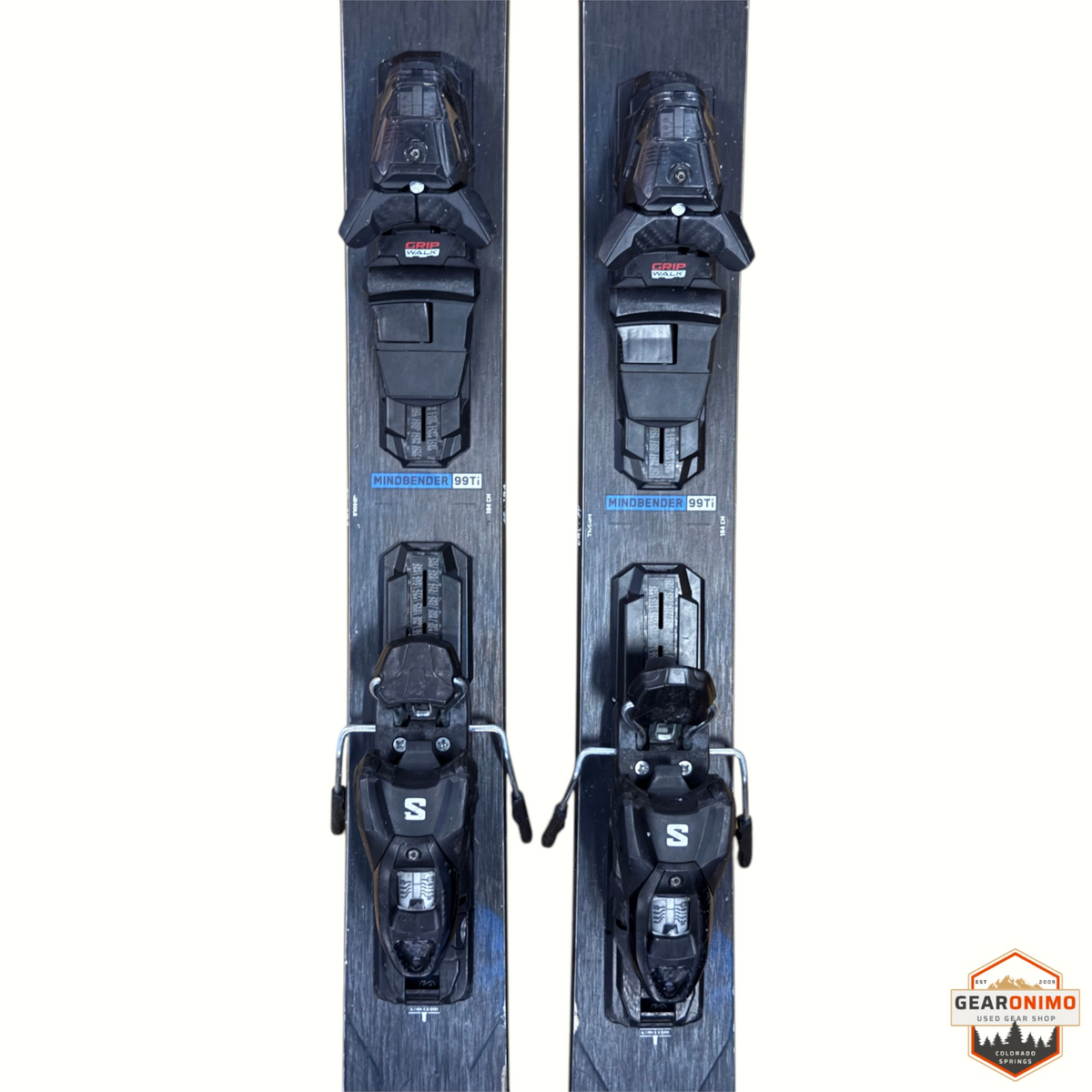 Gearonimo Sports K2 Mindbender 99ti skis in black with mounted Salomon M11 GripWalk bindings, 184cm length
