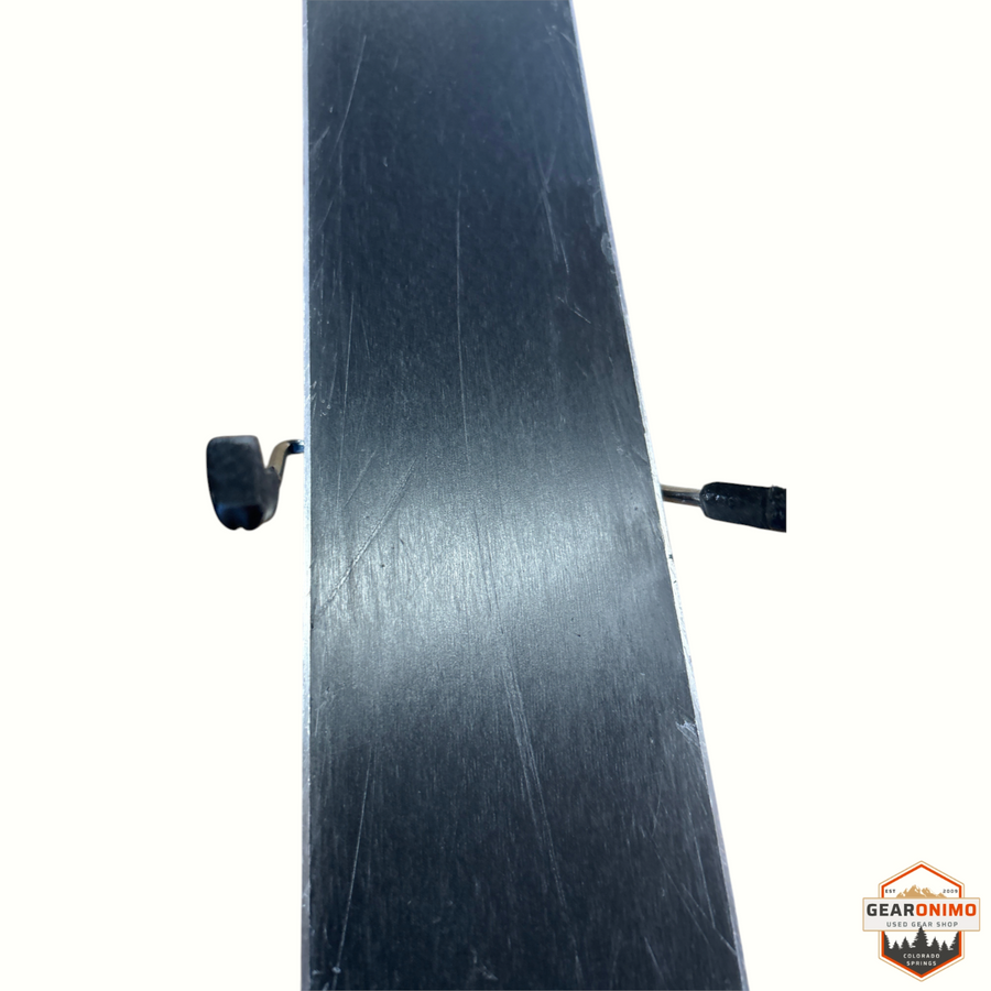 Gearonimo Sports Rossignol Sender 94ti skis with Look Nx12 bindings, showing the black base surface