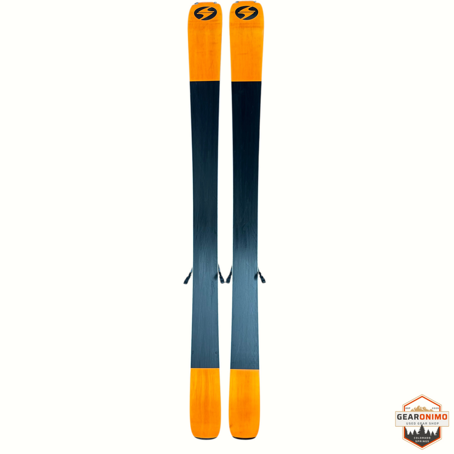 Gearonimo Sports Blizzard Black Pearl 88 skis in black and orange with Marker Tcx 11 bindings, top-down view.