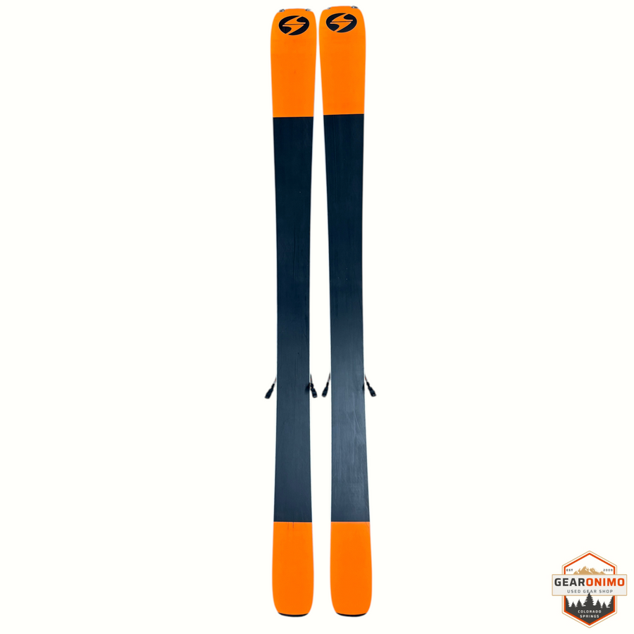 Gearonimo Sports Blizzard Anomaly 88 skis with orange tips and tails and black centers, 164cm length.