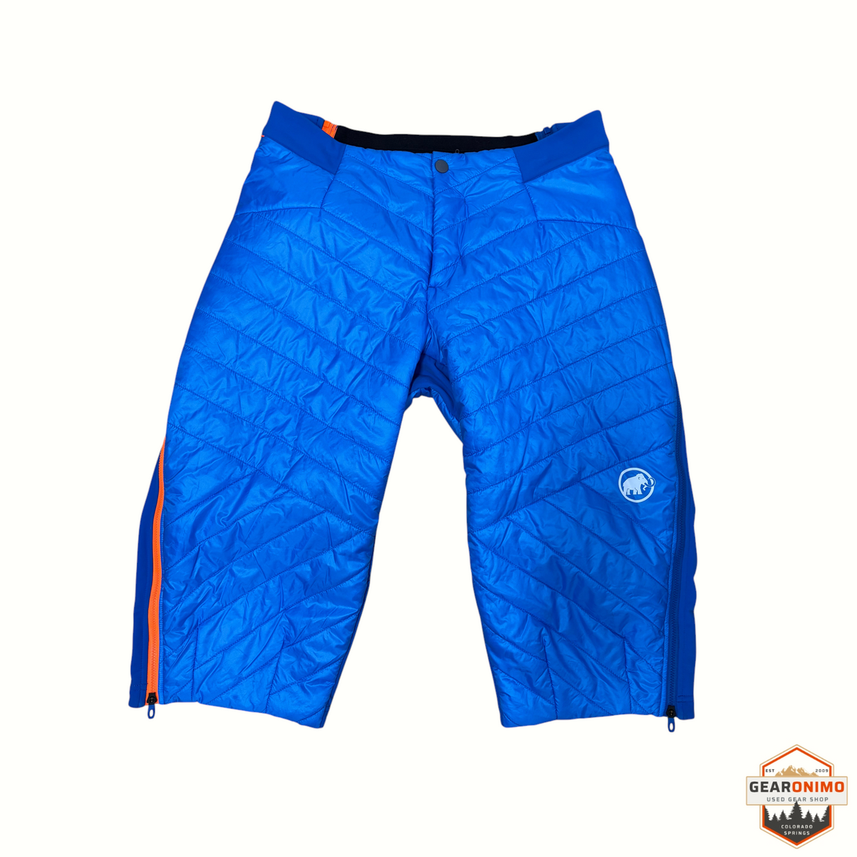 Gearonimo Sports Mammut Aenergy Air hybrid shorts in bright blue with orange side zippers and quilted insulation.