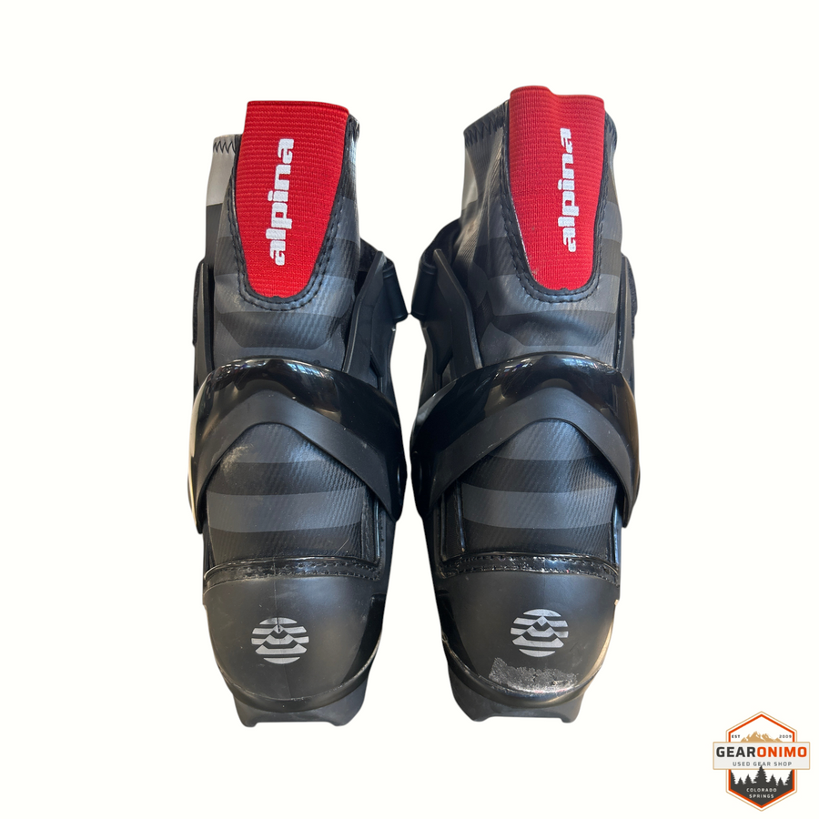 Gearonimo Sports Alpina T-20 Plus touring NNN boots in black with red accents, rear view showing heel support.