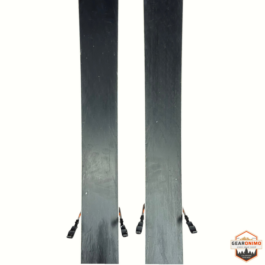 Gearonimo Sports Blizzard Anomaly 94 skis with Salomon M11 bindings, showing the black bases of the 176cm skis.