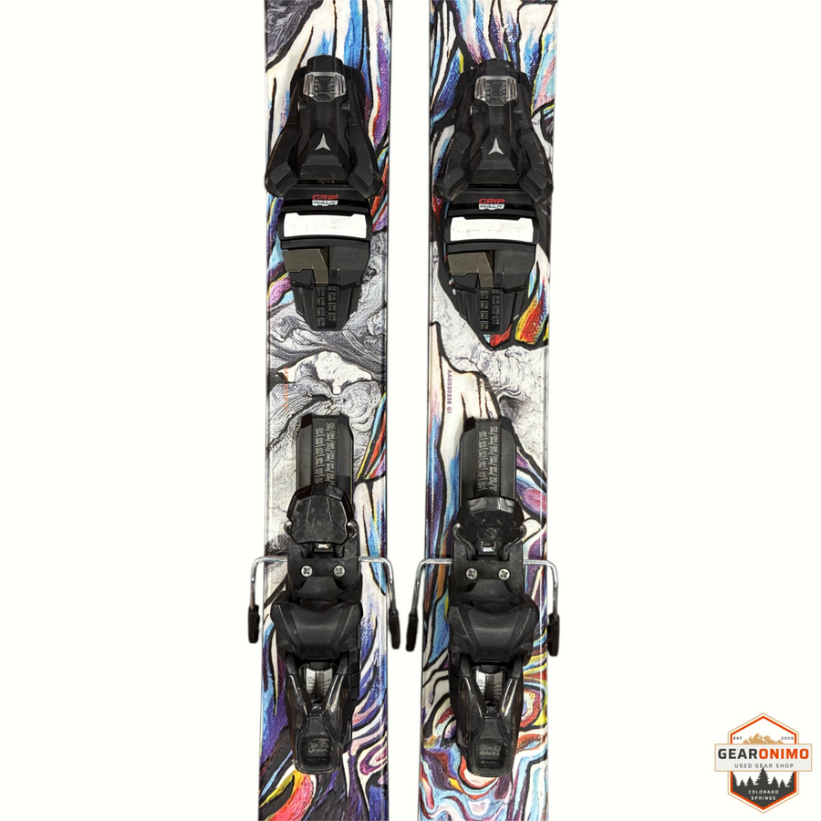 Gearonimo Sports Atomic Bent Chetler 100 skis featuring a colorful abstract graphic design with black Strive 11 bindings