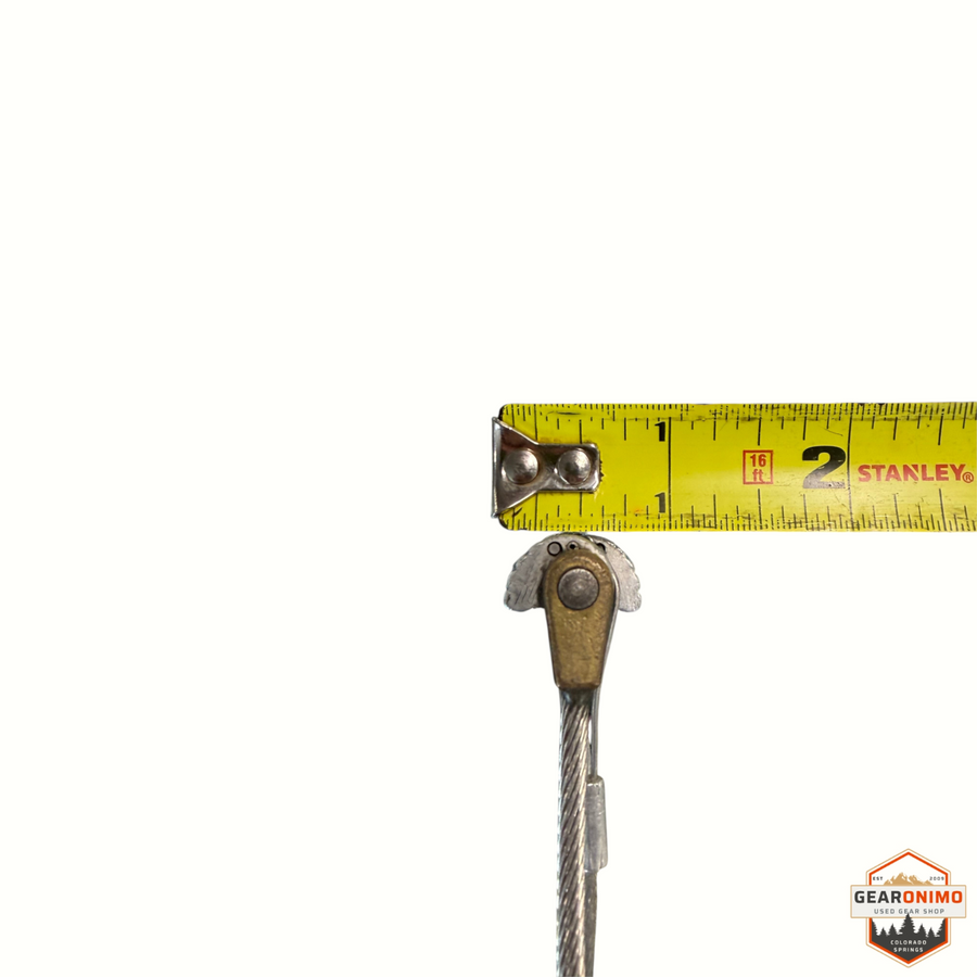 Gearonimo Sports Dmm Quad Cam climbing protection device being measured with a tape measure