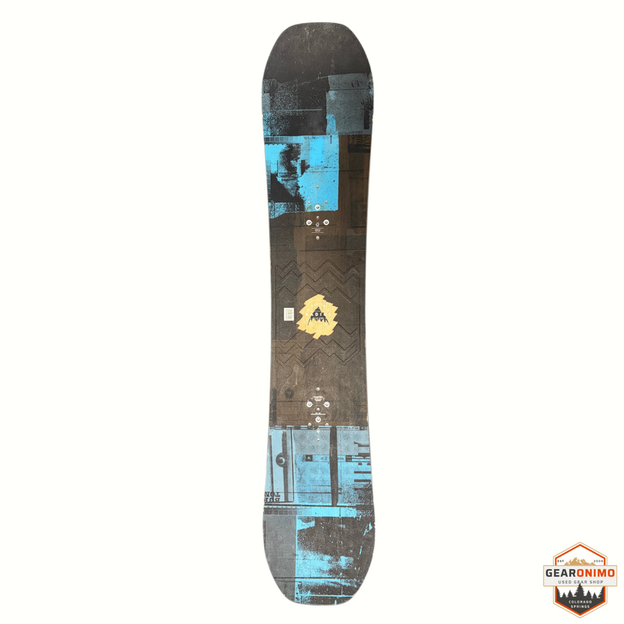 Gearonimo Sports Burton Radius snowboard with a blue and brown graphic design, shown from a top-down view.