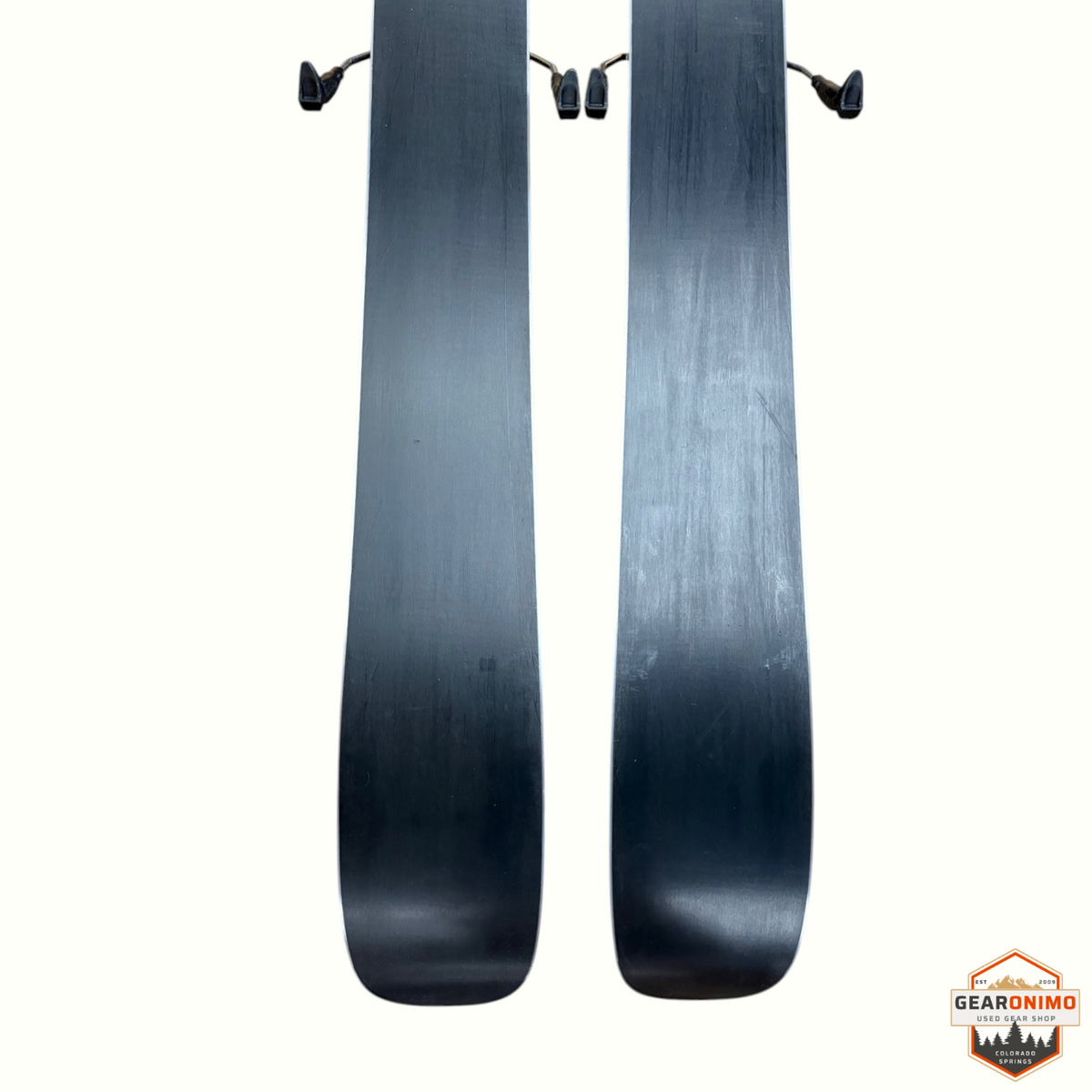Gearonimo Sports Armada Arv 143cm skis featuring a sleek black base design for all-mountain performance