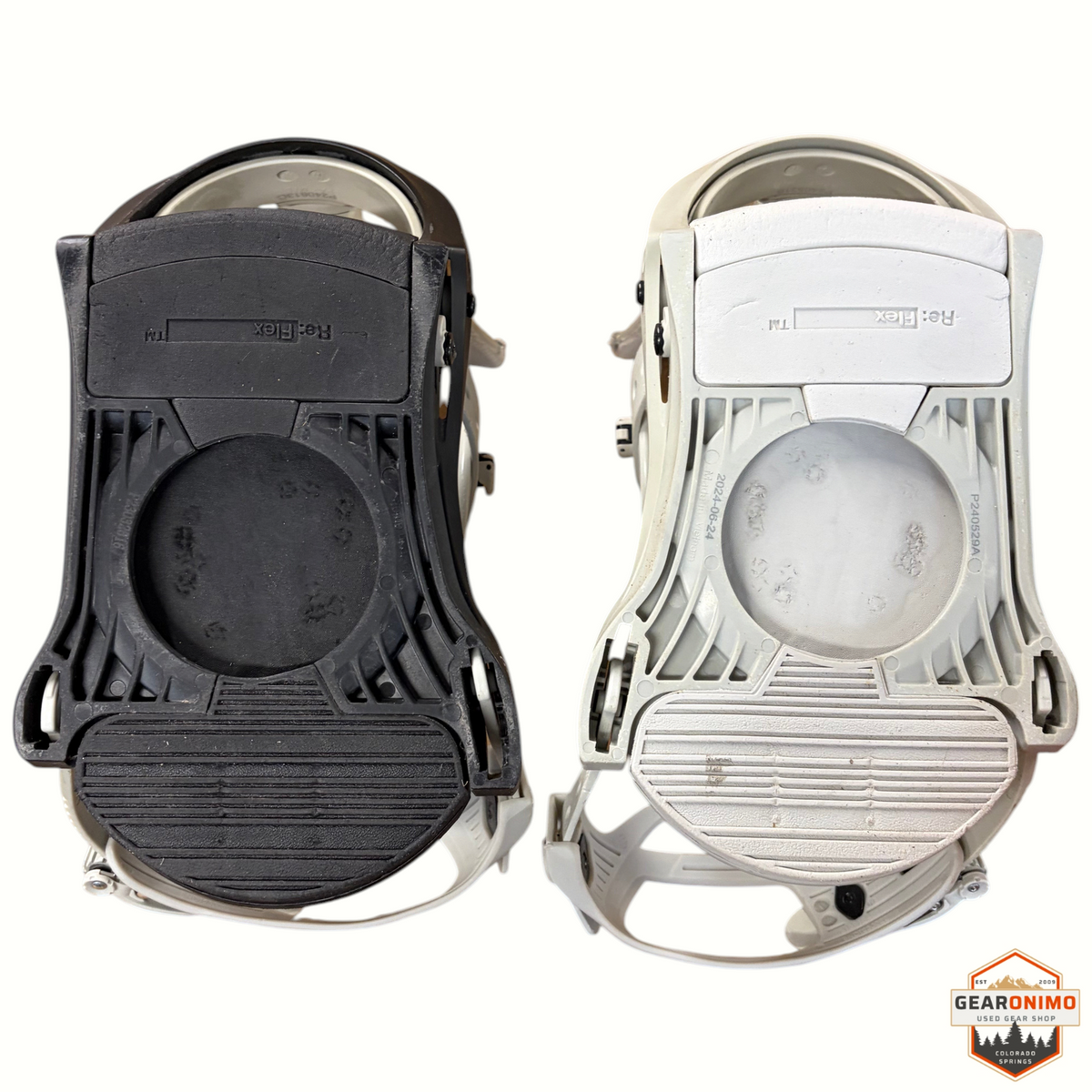Gearonimo Sports Burton Mission snowboard bindings in white and black, showing the Re:Flex baseplate underside.