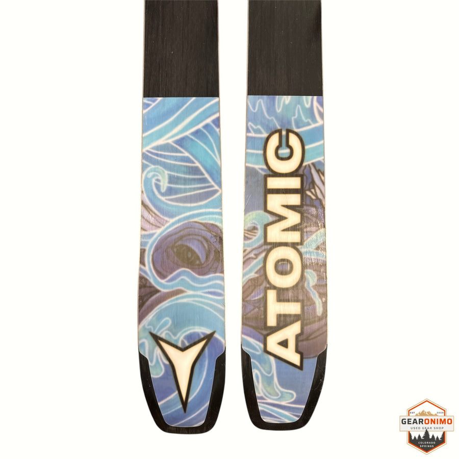 Gearonimo Sports Atomic Bent 100 skis featuring blue and purple wave graphic design on the tips