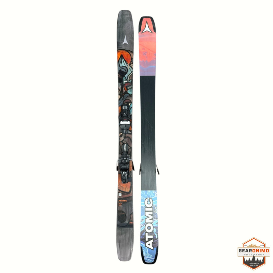 Gearonimo Sports Atomic Bent 100 skis featuring colorful graphic topsheet and black base with bindings