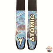 Gearonimo Sports Atomic Bent 100 skis featuring blue and white wave graphic design on the tips