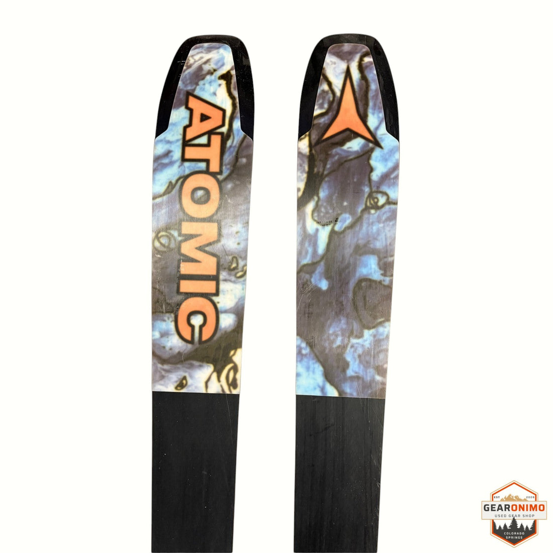 Gearonimo Sports Atomic Bent 100 skis with blue and orange marble graphic topsheets and black bases