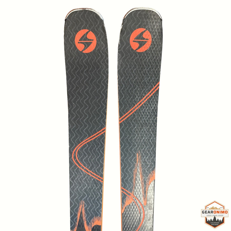 Gearonimo Sports Blizzard Anomany 88 skis with black and orange graphic topsheets and Marker TCX 11 bindings