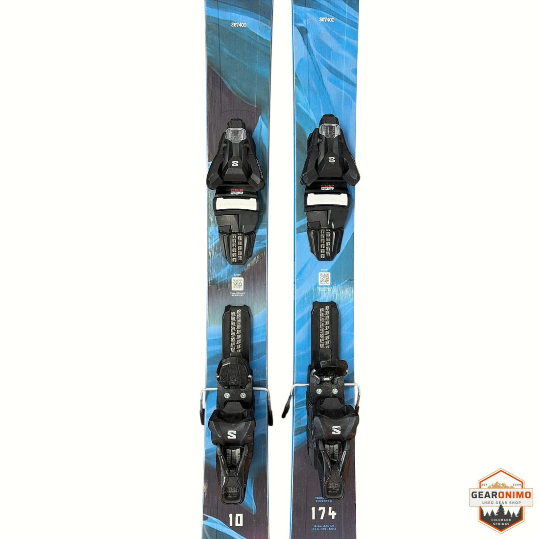 Gearonimo Sports Blizzard Rustler 10 skis in blue with mounted black bindings, 174 cm length, top-down view.