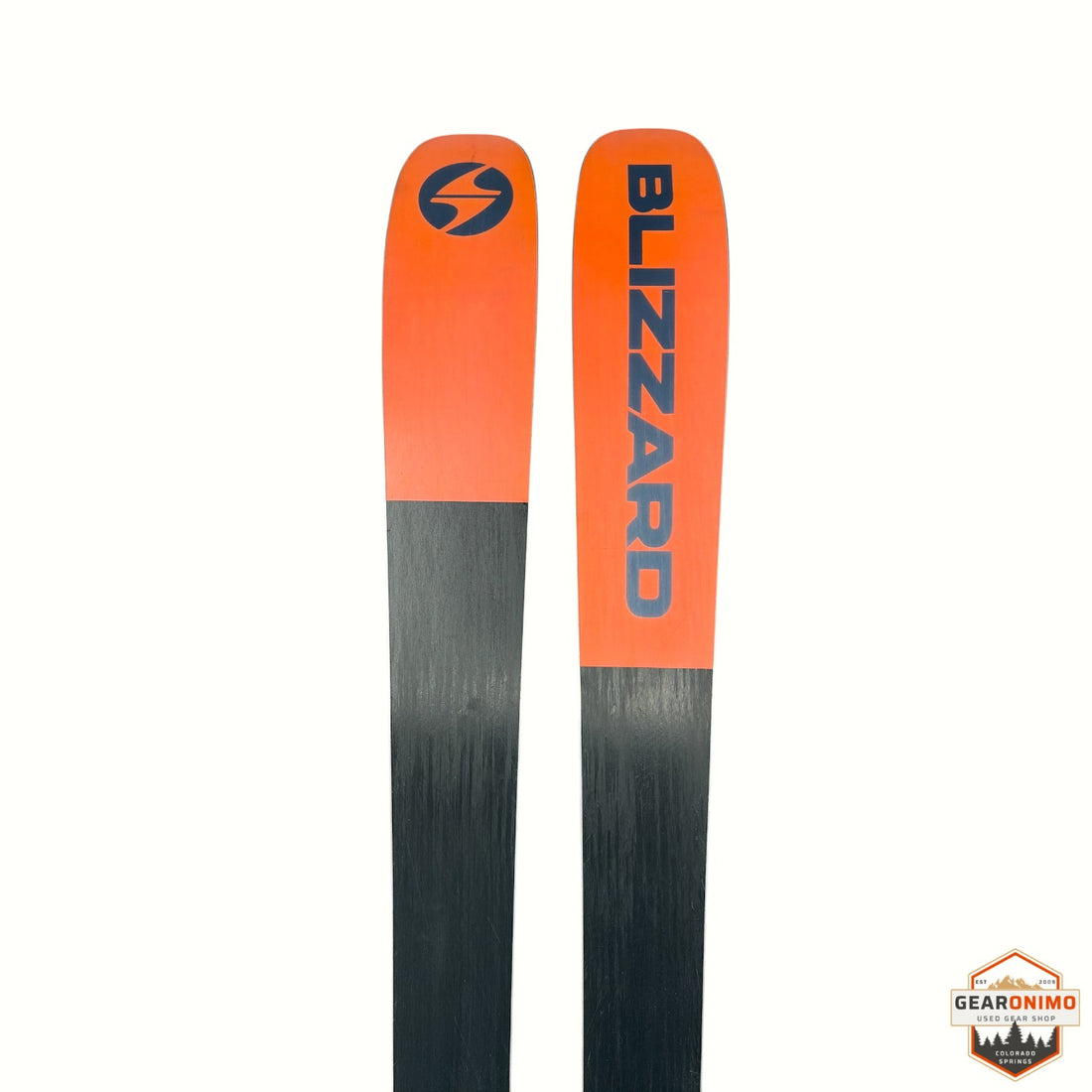 Gearonimo Sports Blizzard Rustler 10 skis in orange and black, featuring the Blizzard logo on the tips.