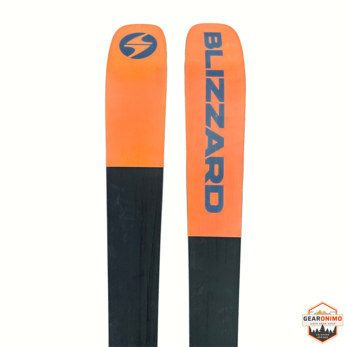 Gearonimo Sports Blizzard Rustler 96 skis featuring a bright orange and black topsheet design with blue branding.