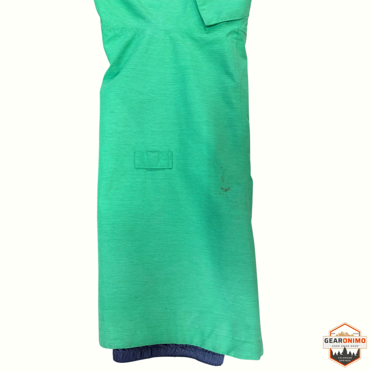 Gearonimo Sports Burton Ak Gtx Summit women's ski pants in bright green with a small fabric stain on the leg