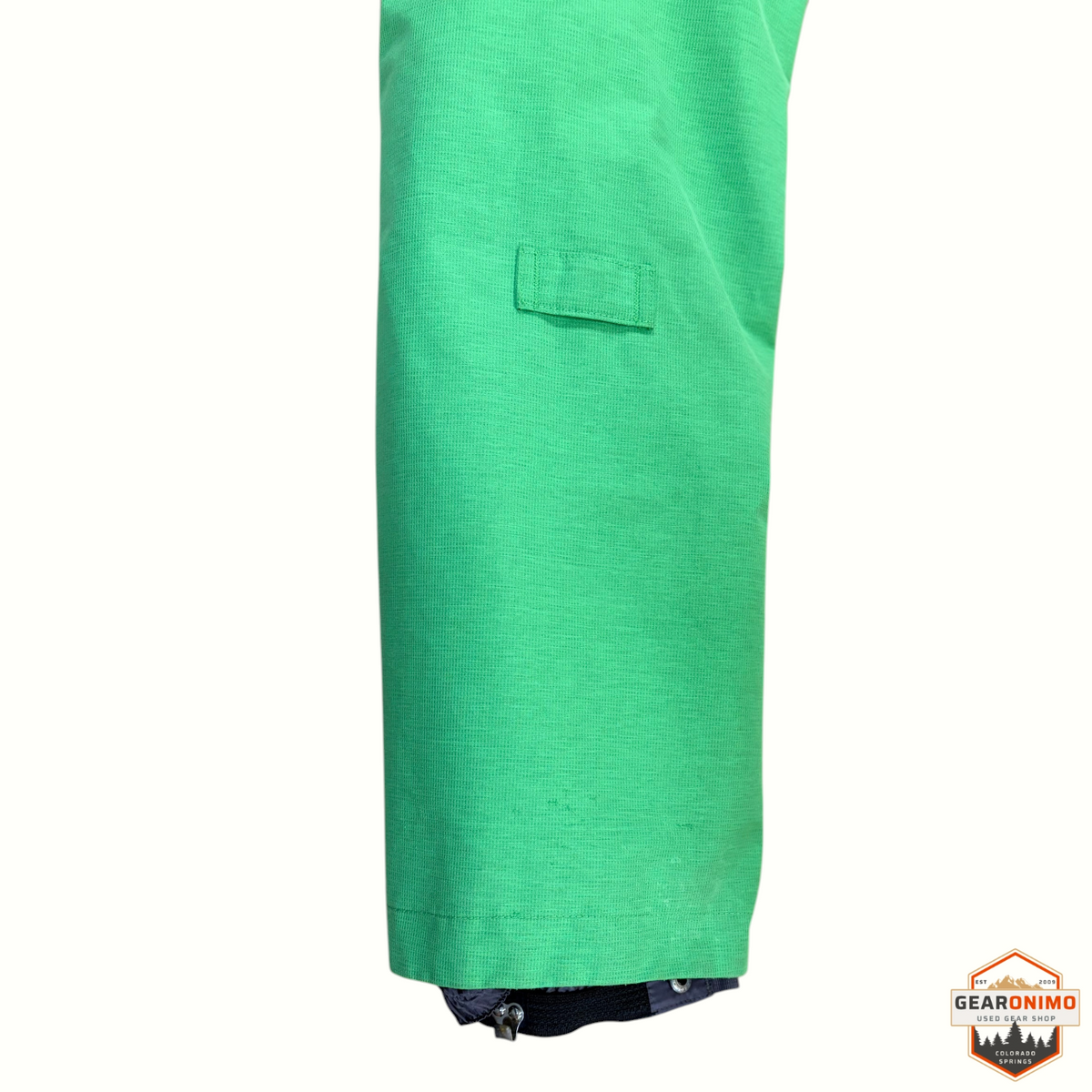 Gearonimo Sports Burton Ak Gtx Summit women's ski pant leg in bright green with reinforced cuff and zipper detail