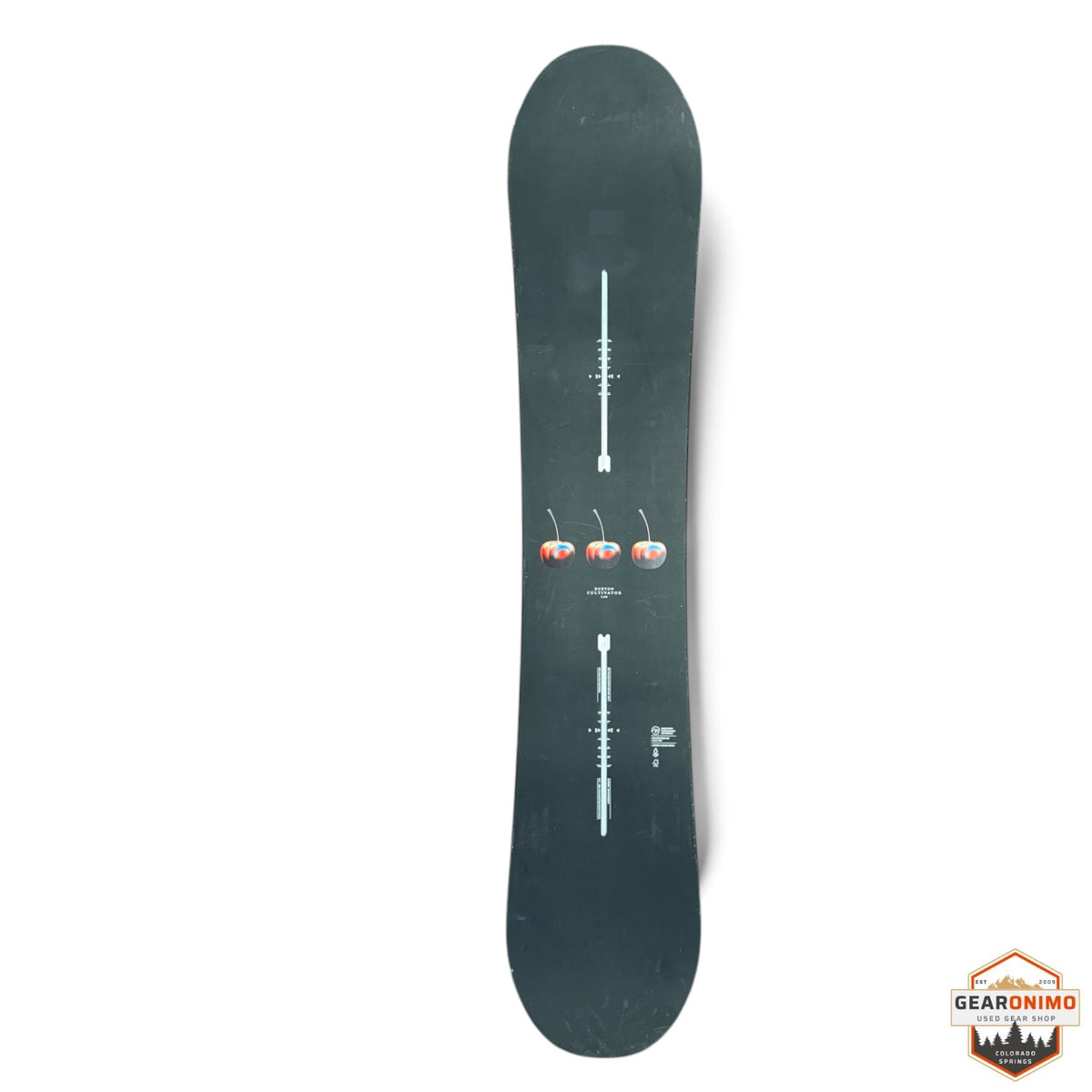 Gearonimo Sports Burton Cultivator snowboard in black with a cherry graphic design on a textured floor