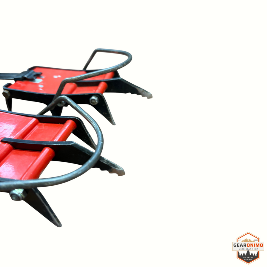 Gearonimo Sports Charlet Moser mono crampons featuring red metal plates and sharp steel spikes for ice climbing