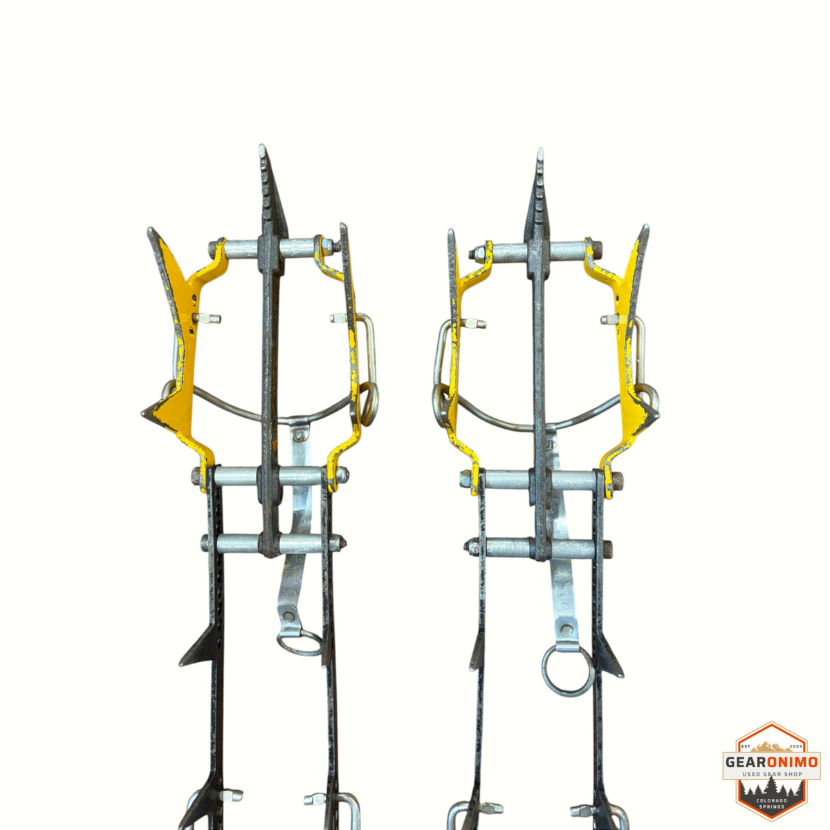 Gearonimo Sports Grivel mono crampons featuring yellow metal frames and steel spikes for ice climbing