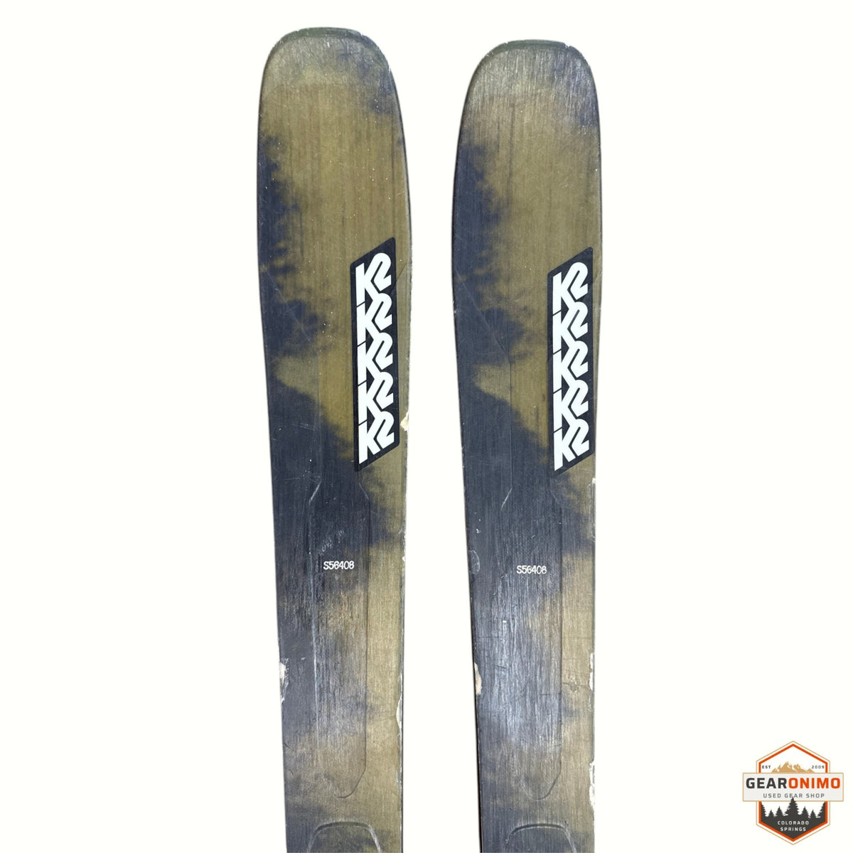 Gearonimo Sports K2 Mind Bender 89 Ti skis in a 164 cm length featuring a dark wood grain finish and white branding.