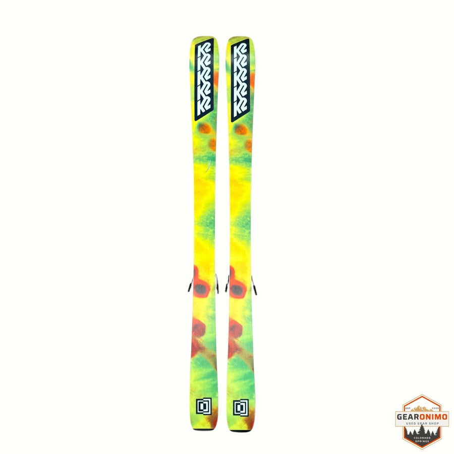 Gearonimo Sports K2 MindBender 89ti skis in a vibrant yellow, green, and red abstract pattern on a white background.