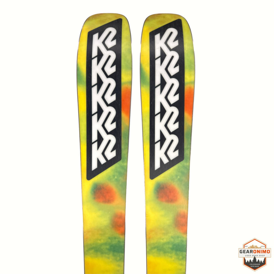 Gearonimo Sports K2 MindBender 89Ti skis featuring a yellow and green tie-dye pattern with black K2 branding