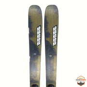 Gearonimo Sports K2 MindBender 89Ti skis in olive green and black with white K2 branding on a textured brown floor