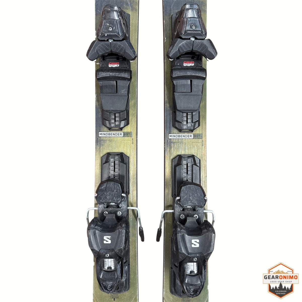 Gearonimo Sports K2 MindBender 89Ti skis with mounted bindings, 164 cm length, top-down view on white background.