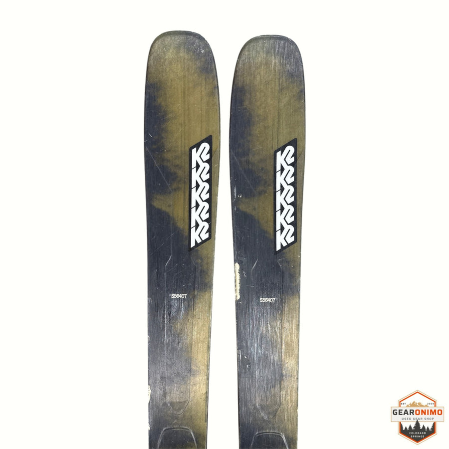 Gearonimo Sports K2 MindBender 89Ti skis featuring a dark olive and black camouflage pattern with white K2 branding.