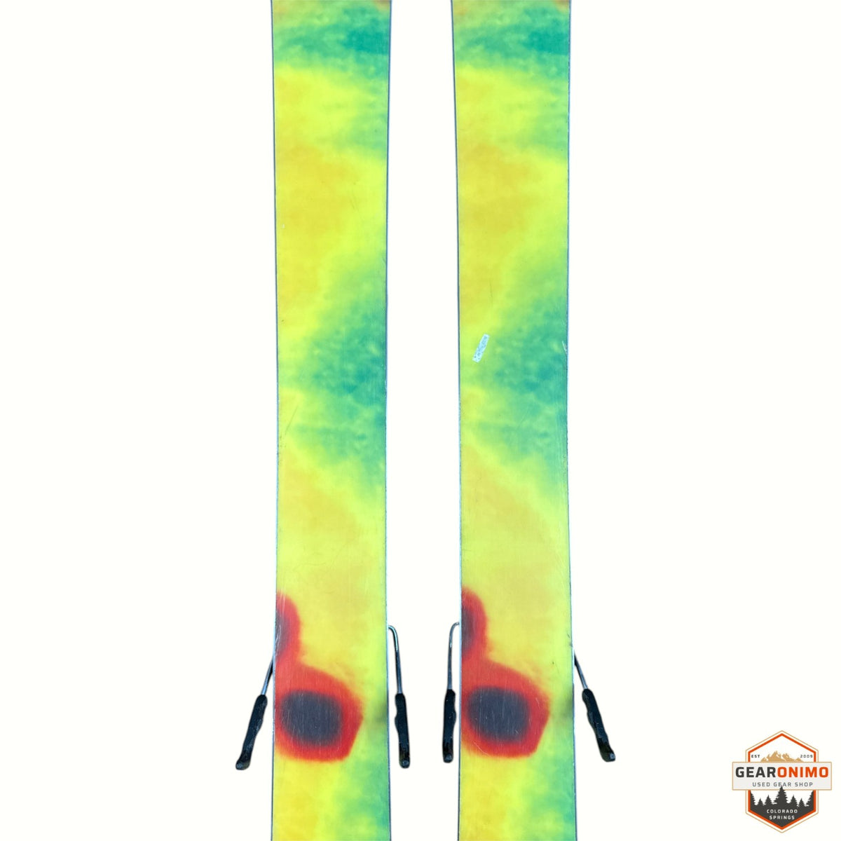 Gearonimo Sports K2 MindBender 89Ti skis featuring a vibrant yellow and green tie-dye pattern with red accents