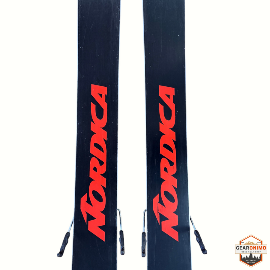 Gearonimo Sports Nordica Enforcer 99 skis in black with red branding, featuring Salomon Strive 11 bindings