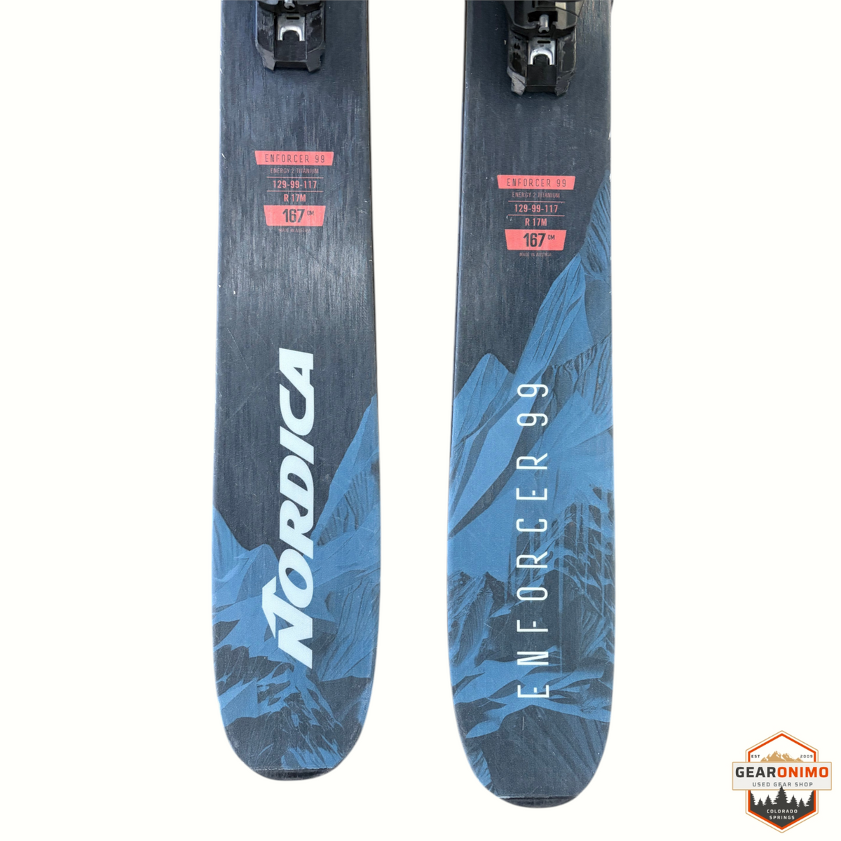 Gearonimo Sports Nordica Enforcer 99 skis in 167cm length with Salomon Strive 11 bindings and blue mountain graphics.
