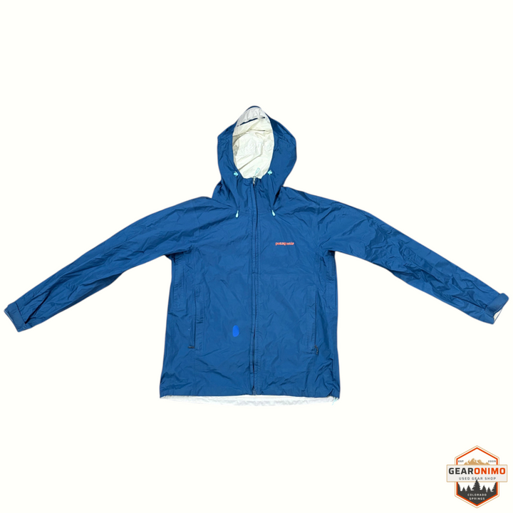 Gearonimo Sports blue Patagonia Torrentshell 3L rain jacket with a small patch on the chest, laid flat on cardboard.