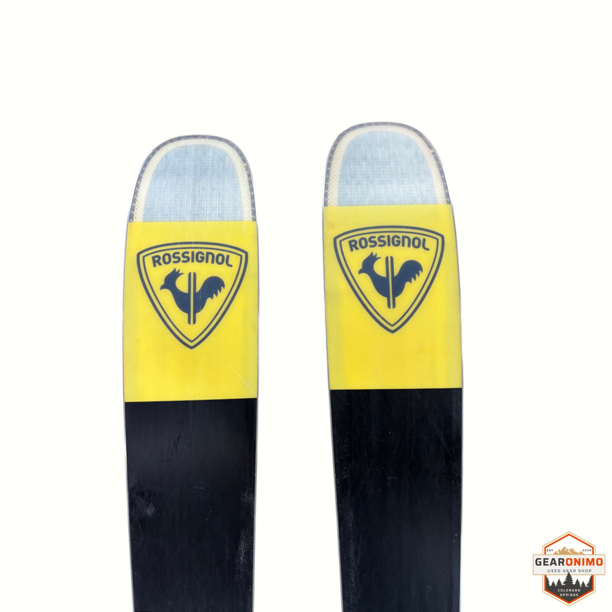 Gearonimo Sports Rossignol Sender Soul 102 skis with yellow and black topsheet design and rooster logo