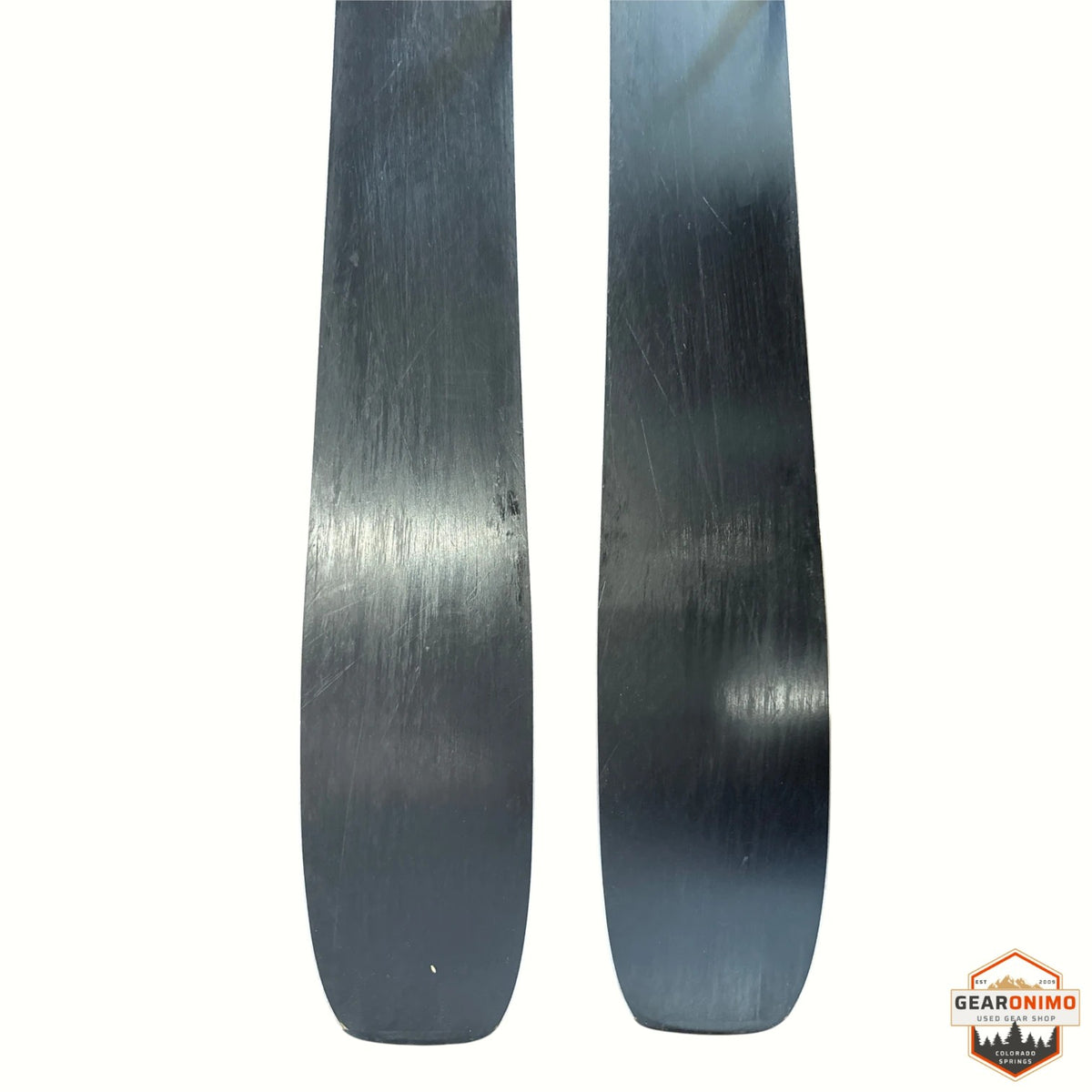 Gearonimo Sports Salomon QST 92 skis showing the black bases with light surface wear