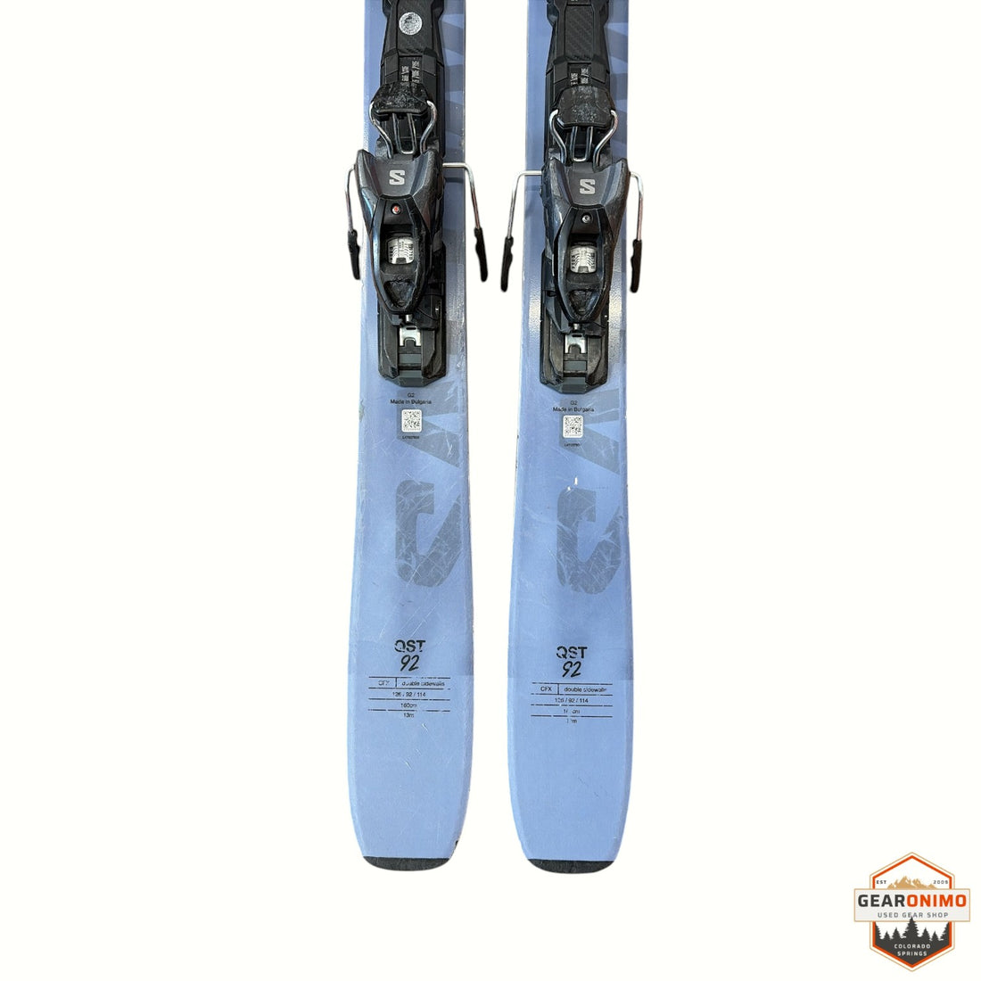 Gearonimo Sports Salomon QST 92 skis in light blue with pre-mounted bindings, 160 cm length, top-down view.