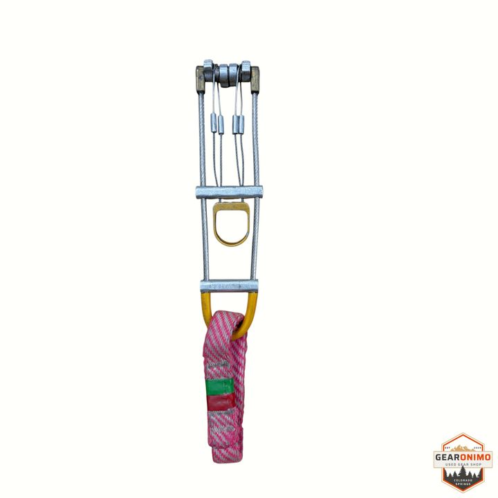 Gearonimo Sports Dmm Quad Cam active climbing protection device with pink sling and metal cam lobes
