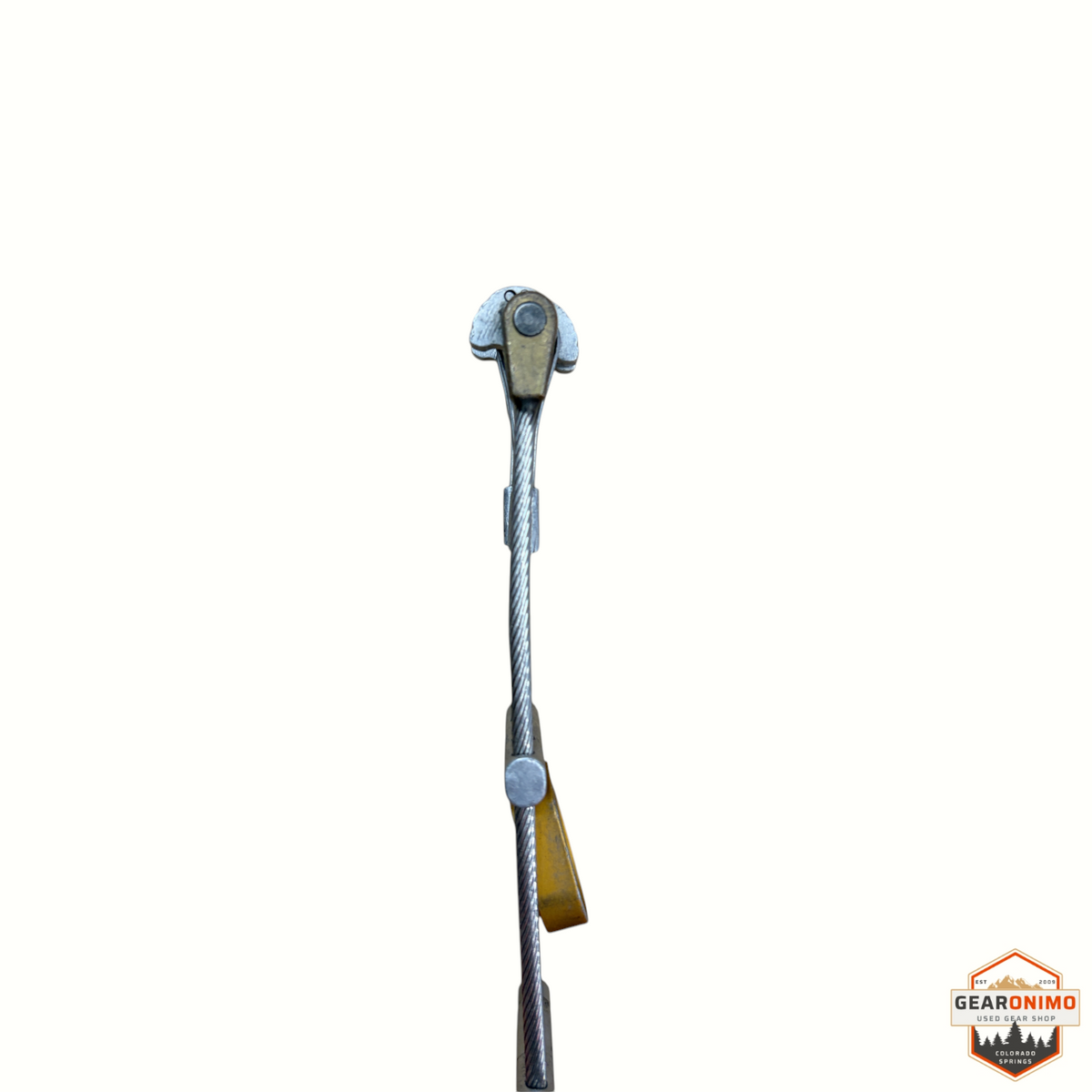 Gearonimo Sports Dmm Quad Cam climbing protection device showing signs of wear on the metal cam head and wire stem