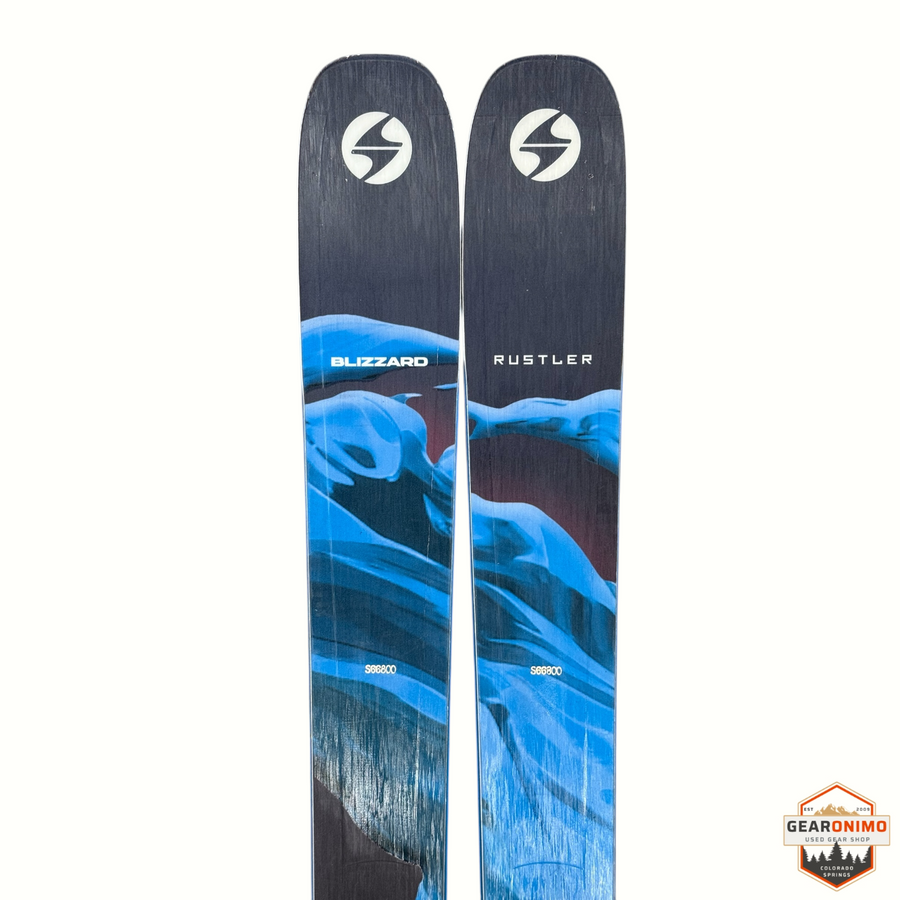 Gearonimo Sports Blizzard Rustler 10 skis in black and blue with abstract mountain graphic design
